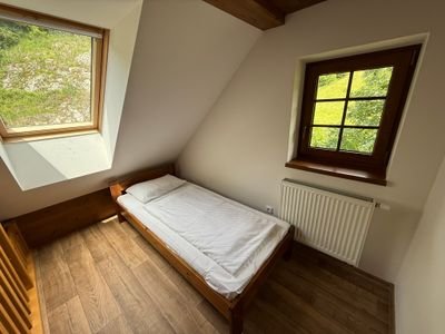 Podkroví s dvojlůžkem a dalším lůžkem