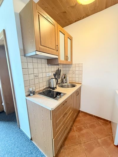 Apartmán 4 — dřevěné schody do podkroví